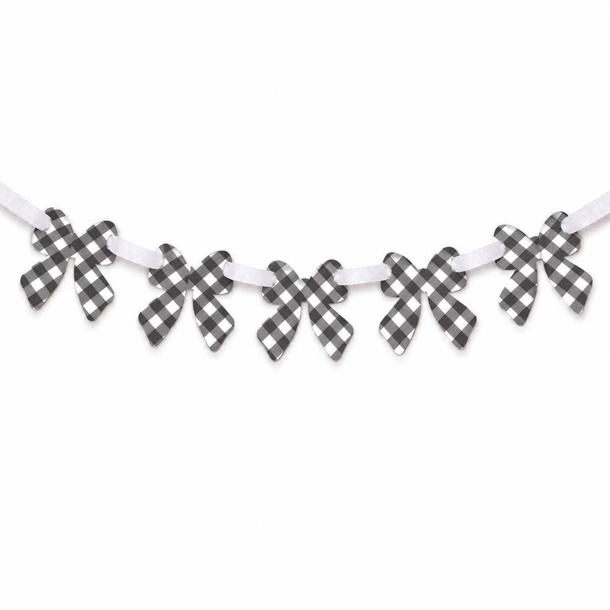 Small black gingham printable bows arranged for party decor